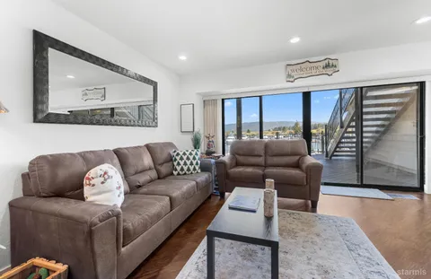 a living room with furniture and a couch