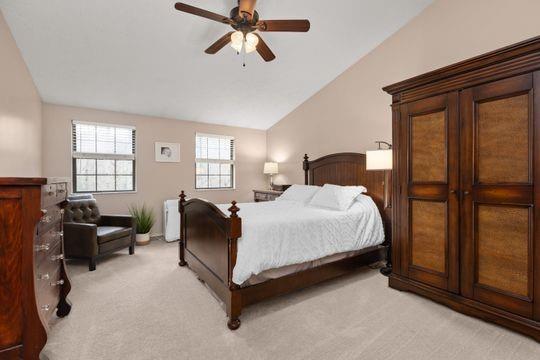 203 West Cruikshank Road Butler, PA 16002 - Photo 15 of 32 a bedroom with a bed couch and windows