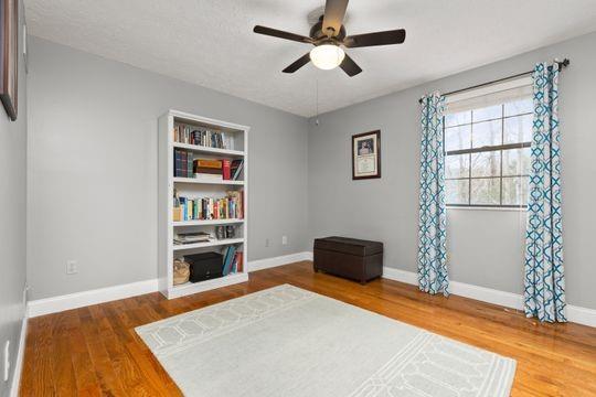 203 West Cruikshank Road Butler, PA 16002 - Photo 19 of 32 a bedroom with a bed and a book shelf