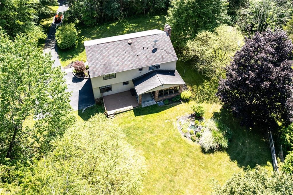 203 West Cruikshank Road Butler, PA 16002 - Photo 32 of 32 an aerial view of a house with swimming pool and large trees