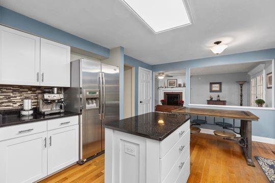 203 West Cruikshank Road Butler, PA 16002 - Photo 4 of 32 a kitchen with stainless steel appliances granite countertop a sink a stove and refrigerator
