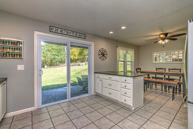 a room with a large bed and a window