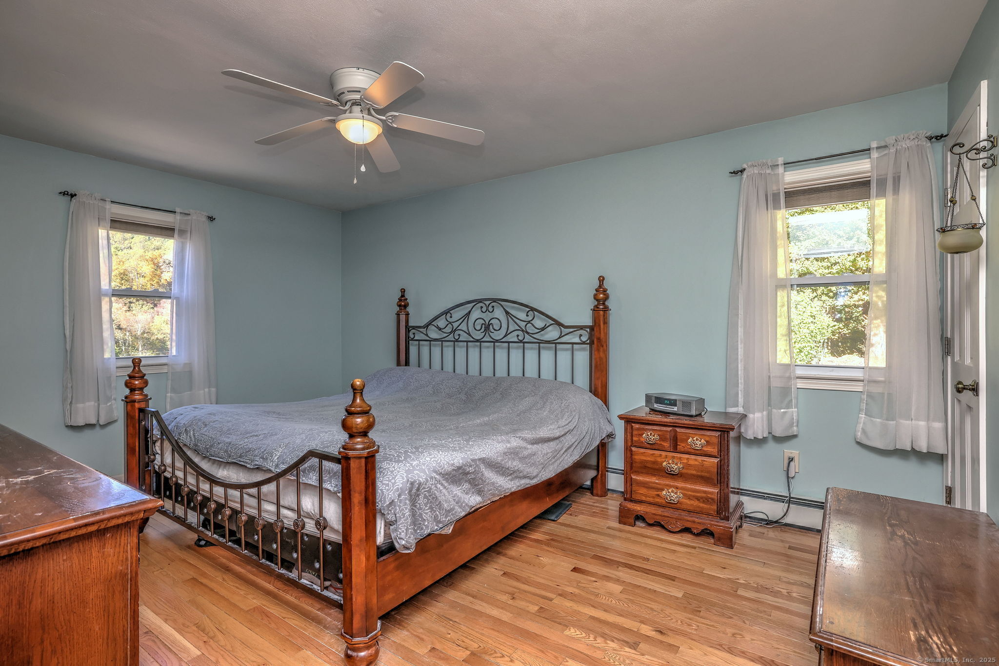 78 Hillside Drive Beacon Falls, CT 06403 - Photo 19 of 40 a bed room with a bed and a chair