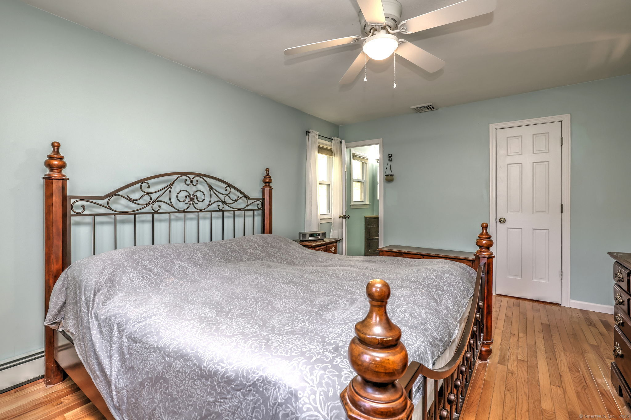 78 Hillside Drive Beacon Falls, CT 06403 - Photo 20 of 40 a bedroom with a bed and a chandelier