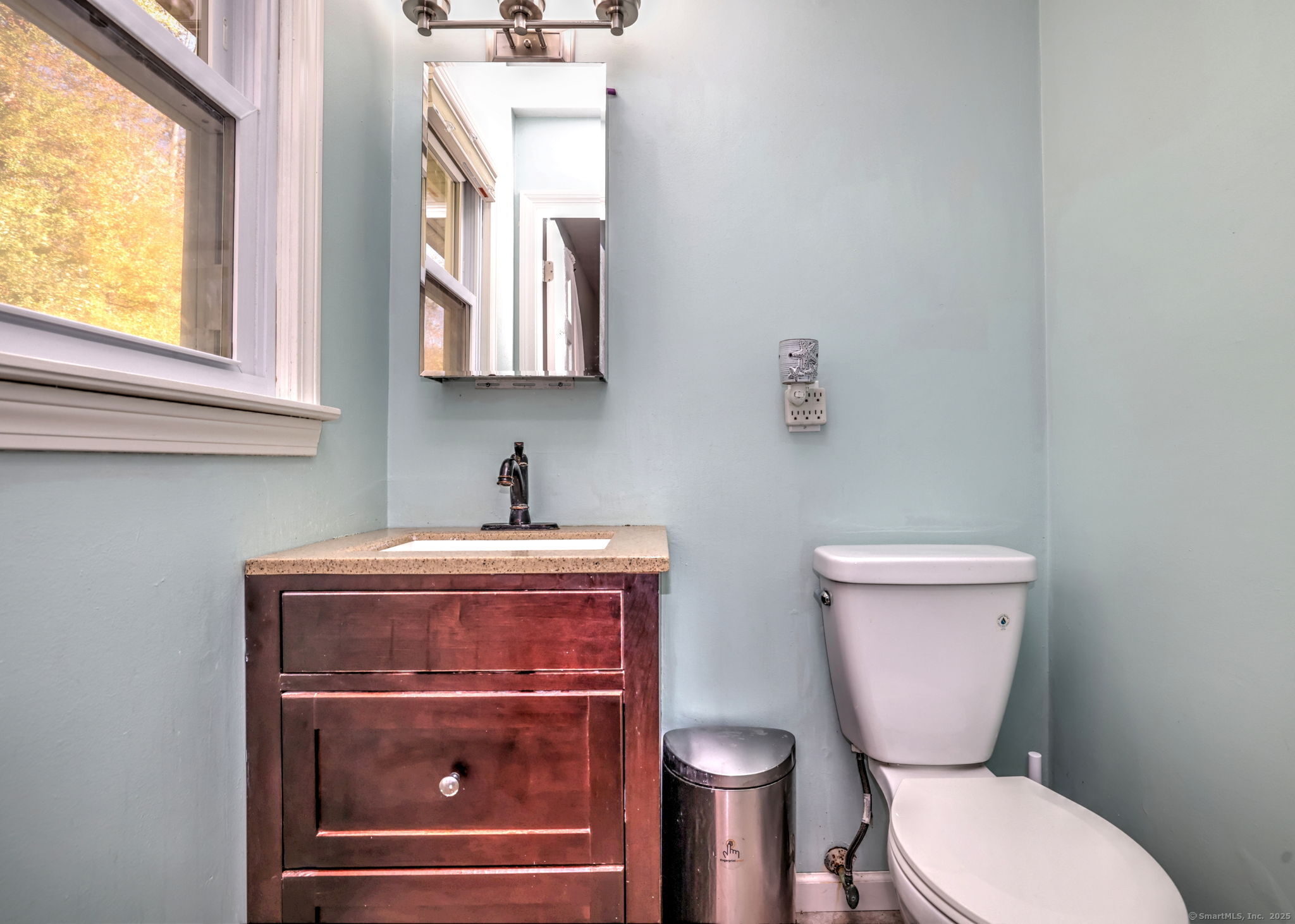 78 Hillside Drive Beacon Falls, CT 06403 - Photo 21 of 40 a bathroom with a toilet a sink and a window