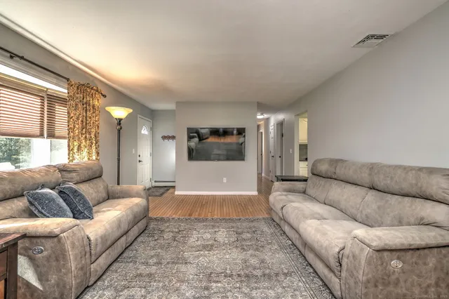 a living room with furniture and a couch