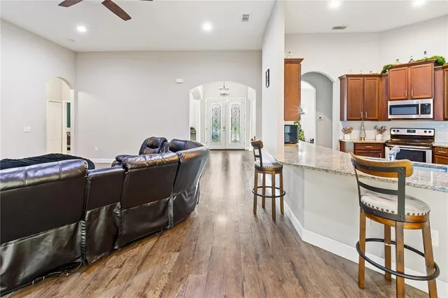 a bedroom with a bed and a table