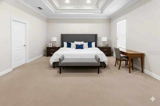 a bedroom with furniture and a couch