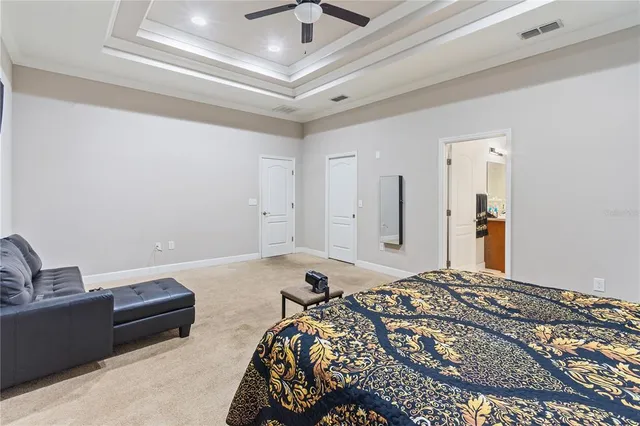 a bathroom with a sink double vanity granite tub shower and mirror
