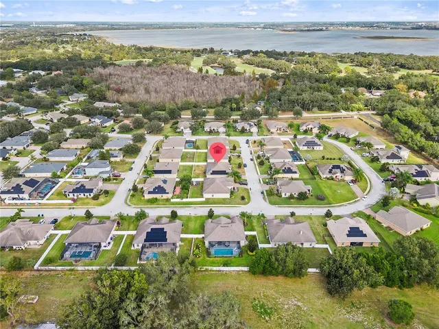 an aerial view of residential building with outdoor space