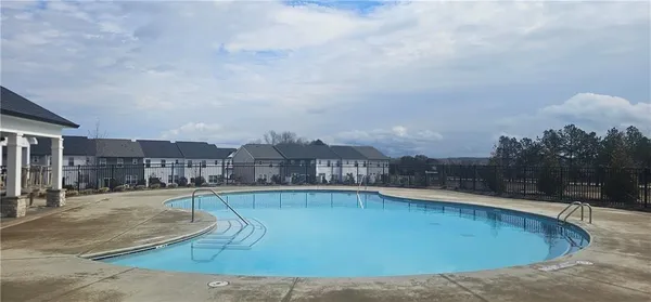 a view of a swimming pool and a terrace