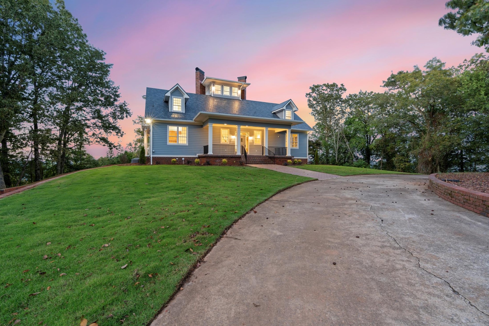 583 Bell Point Road Laceys Spring, AL 35754 - Photo 2 of 50 a front view of a house with a yard and garage