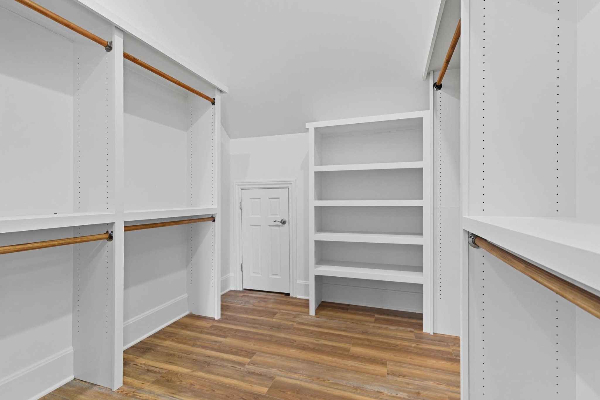 583 Bell Point Road Laceys Spring, AL 35754 - Photo 21 of 50 a view of walk in closet with empty racks