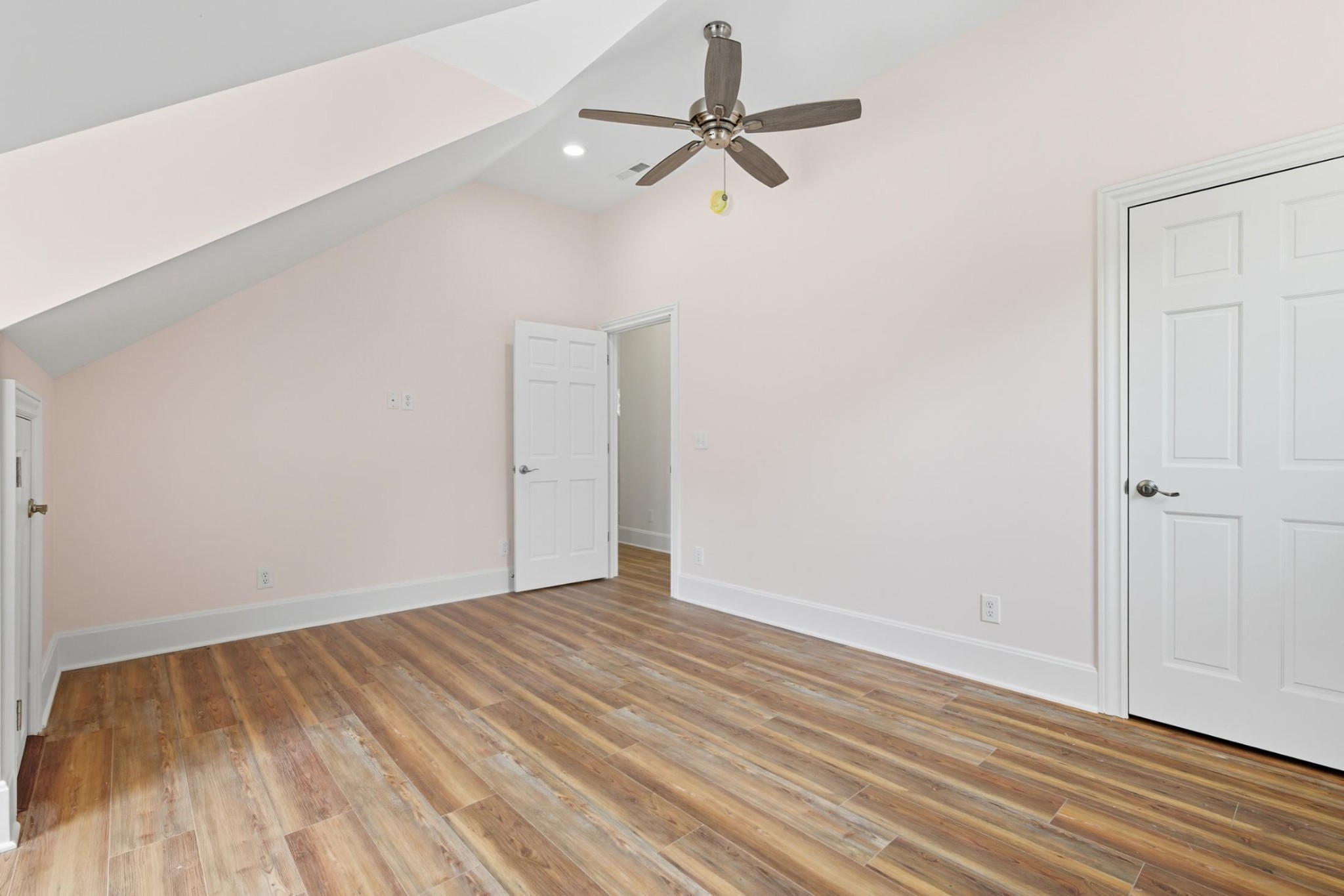 583 Bell Point Road Laceys Spring, AL 35754 - Photo 28 of 50 a view of room with wooden floor and ceiling fan