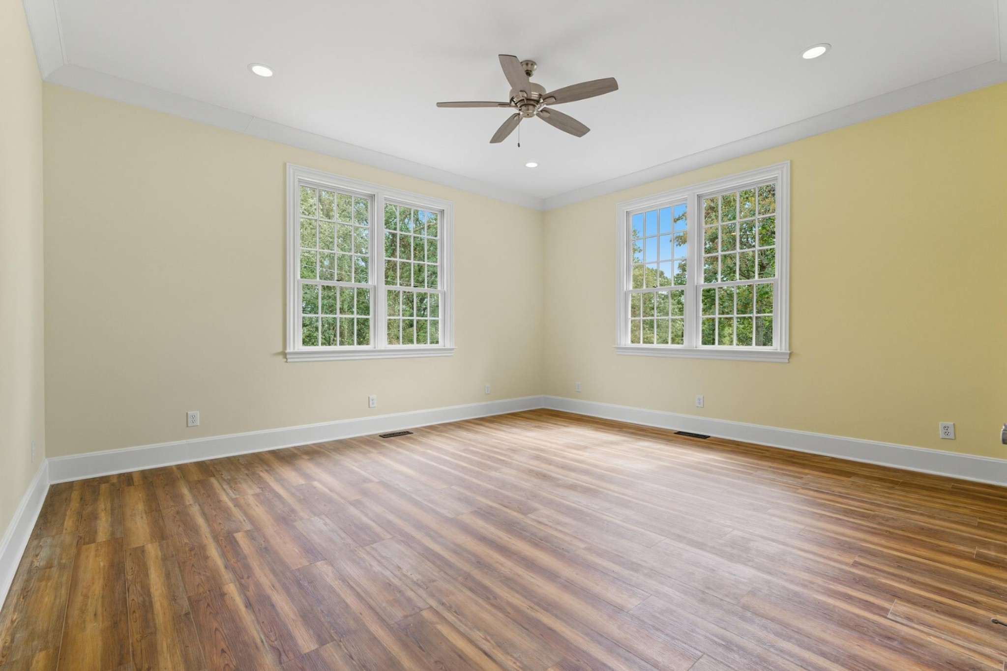 583 Bell Point Road Laceys Spring, AL 35754 - Photo 29 of 50 a view of an empty room with wooden floor and a window