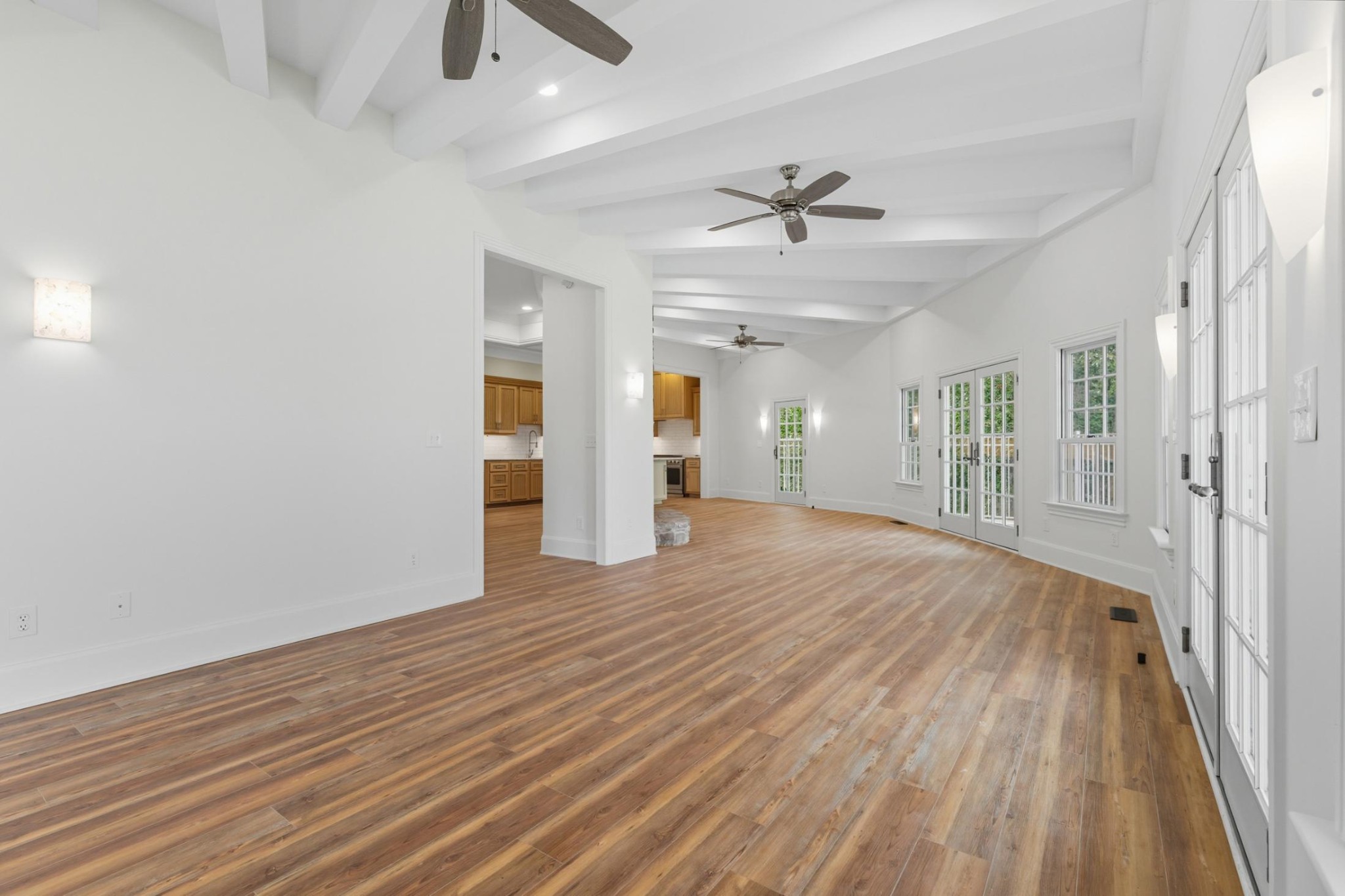 583 Bell Point Road Laceys Spring, AL 35754 - Photo 8 of 50 wooden floor in an empty room with a window