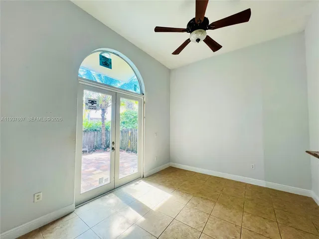 a view of an empty room and window