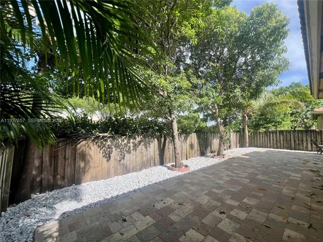 a street view with wooden fence