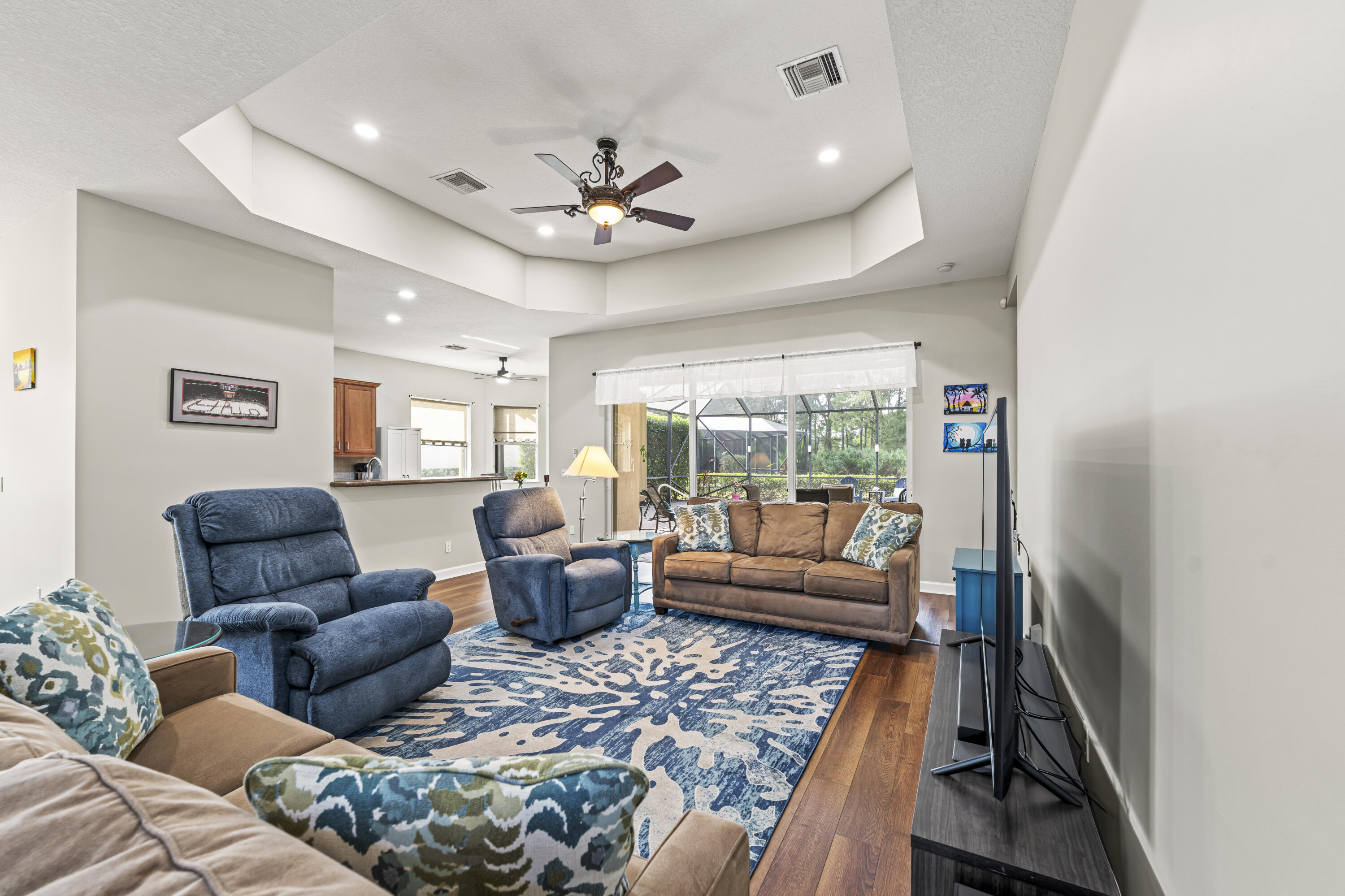 9184 Pumpkin Ridge Port St. Lucie, FL 34986 - Photo 11 of 74 a living room with furniture and a large window