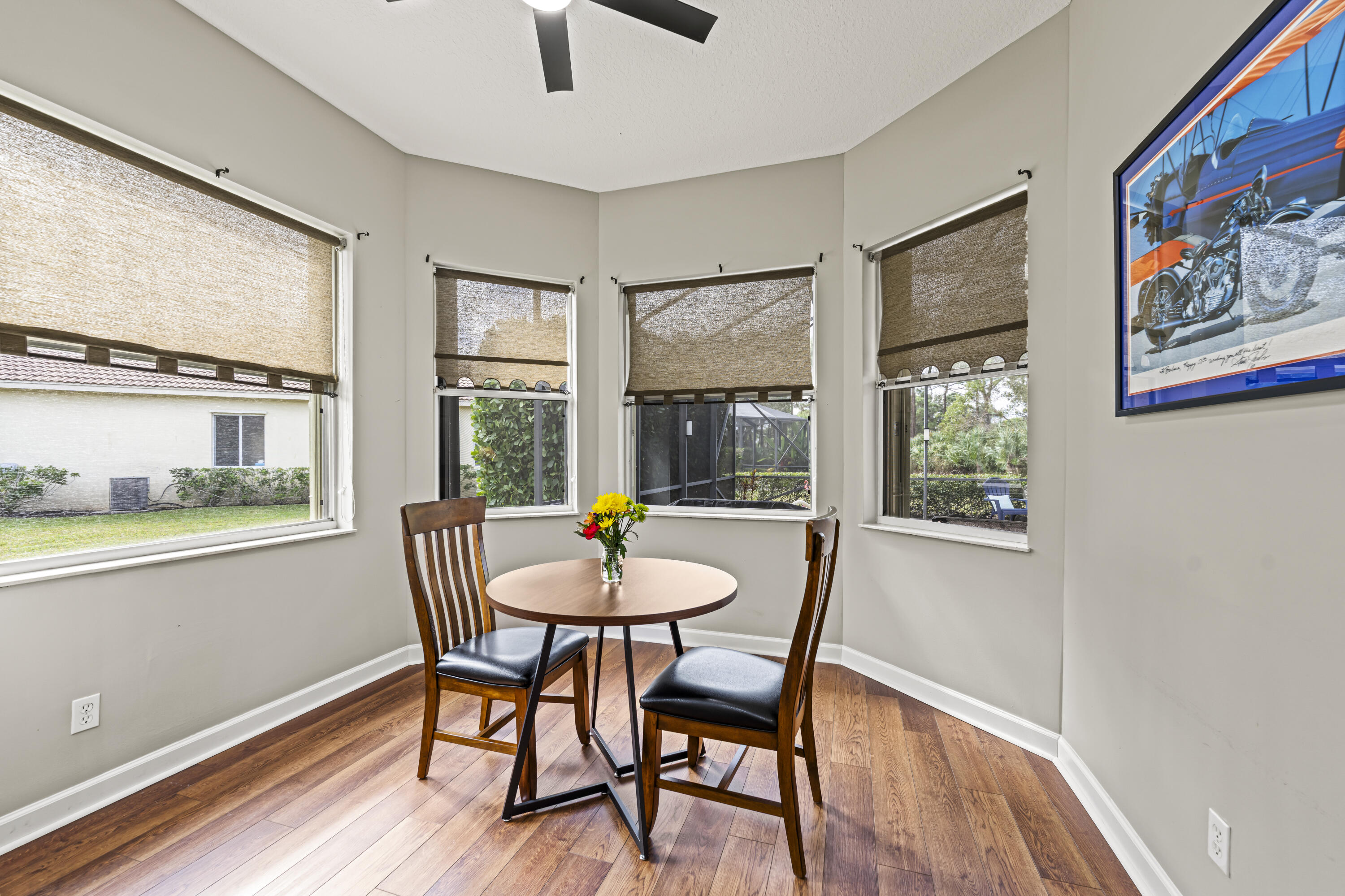 9184 Pumpkin Ridge Port St. Lucie, FL 34986 - Photo 19 of 74 a view of a dining room with furniture window and outside view