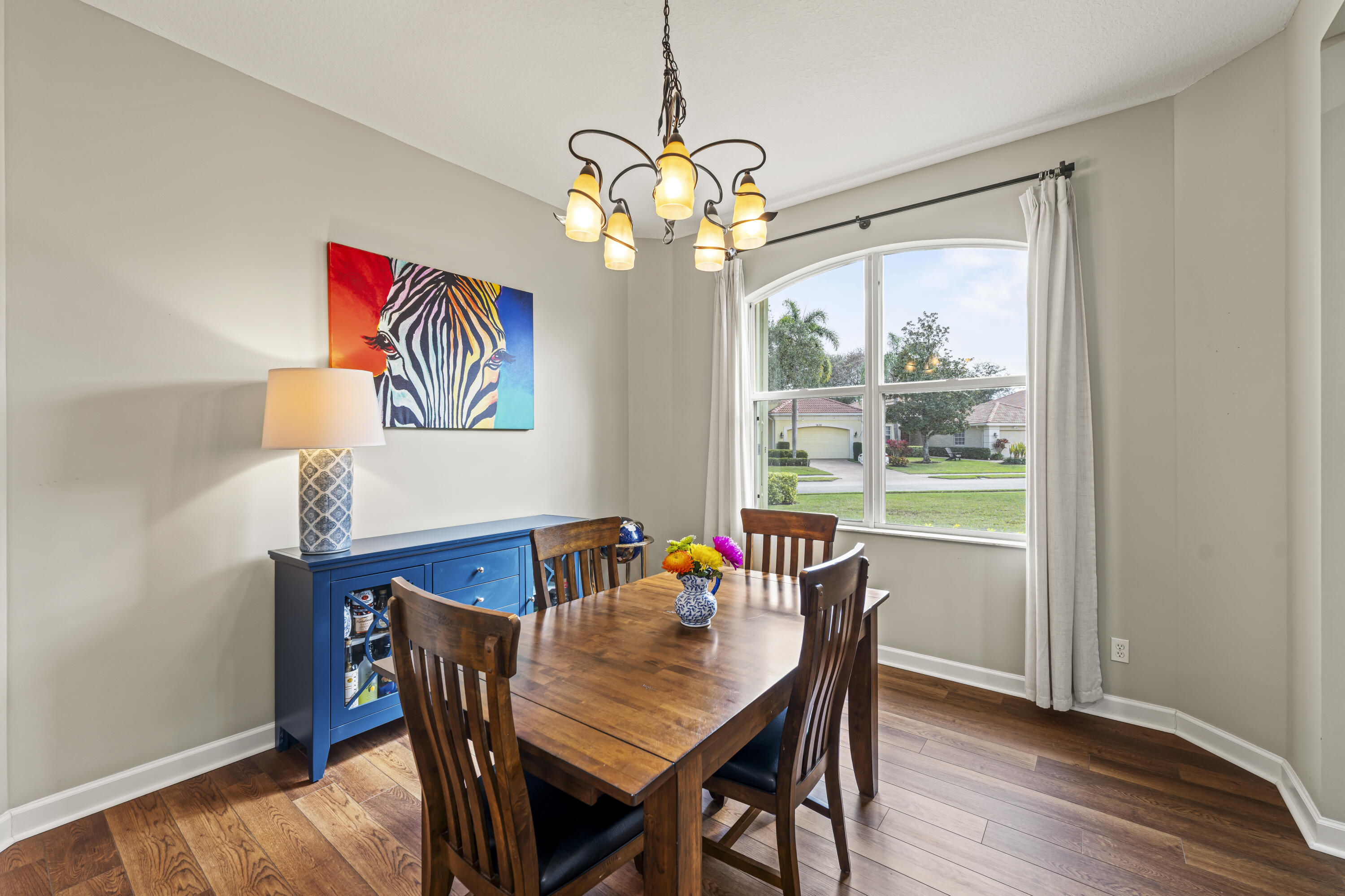 9184 Pumpkin Ridge Port St. Lucie, FL 34986 - Photo 22 of 74 a view of a dining room with furniture window and outside view