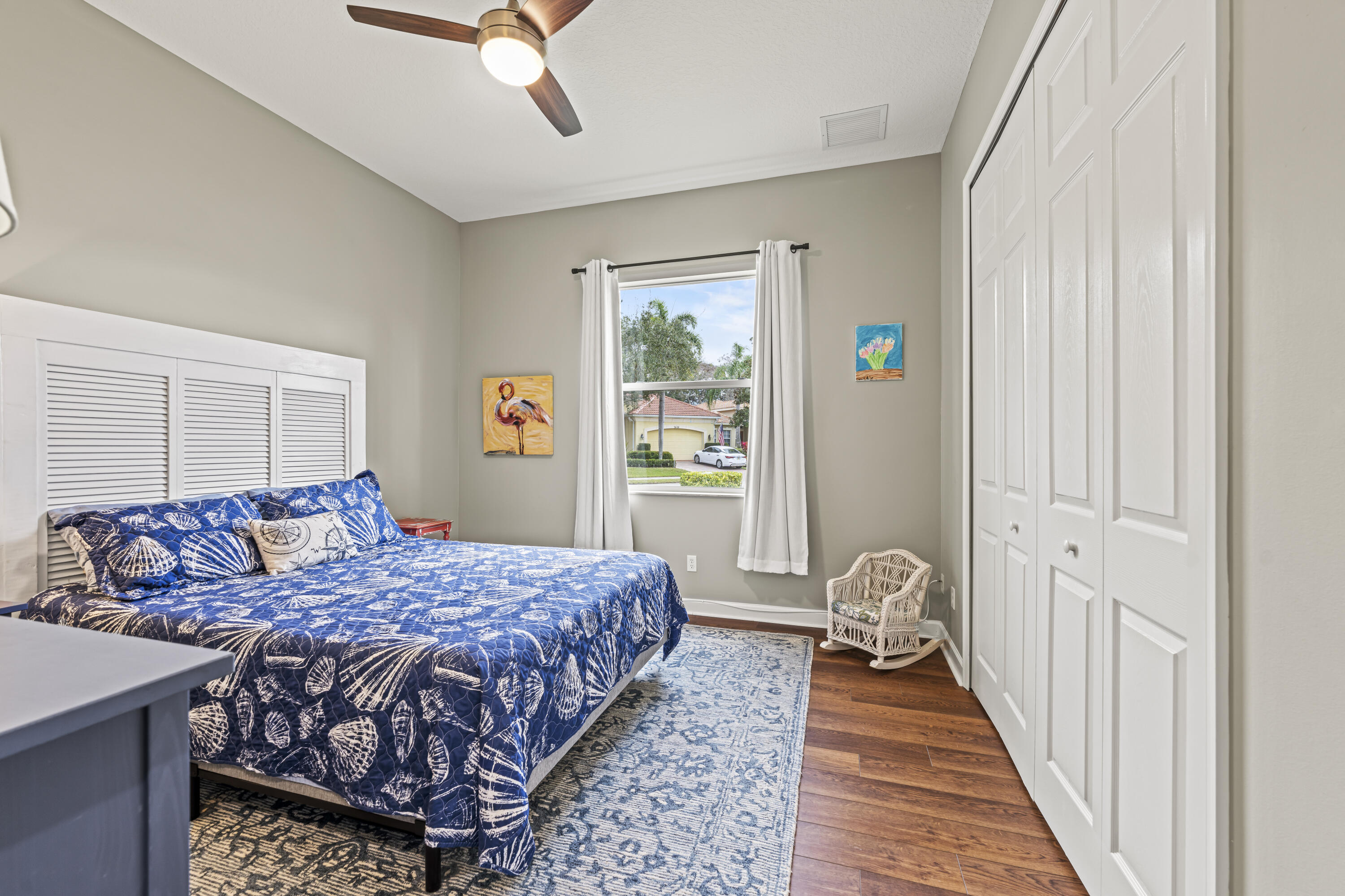 9184 Pumpkin Ridge Port St. Lucie, FL 34986 - Photo 31 of 74 a bedroom with a bed and a window