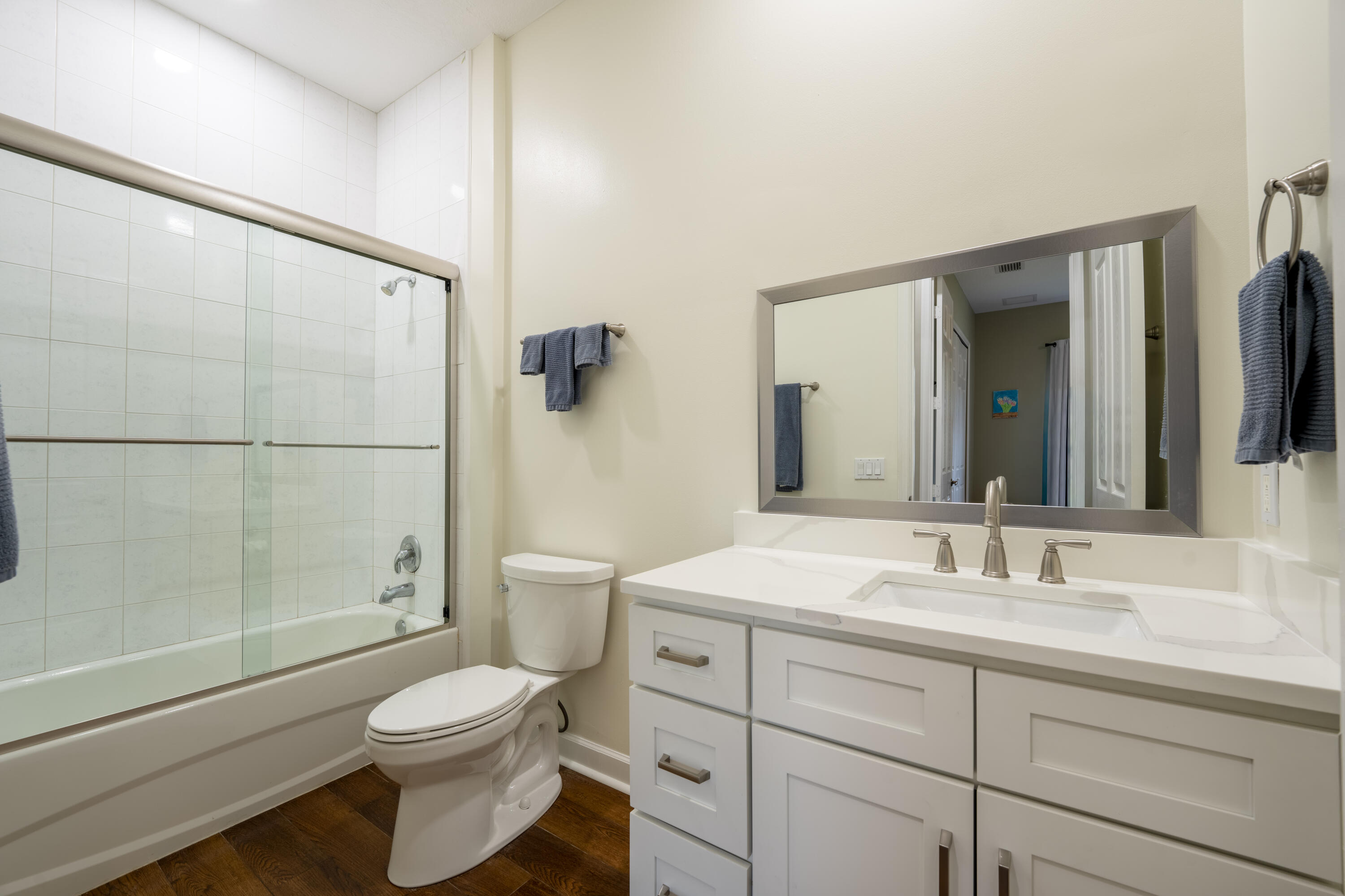 9184 Pumpkin Ridge Port St. Lucie, FL 34986 - Photo 33 of 74 a bathroom with a sink a toilet and shower