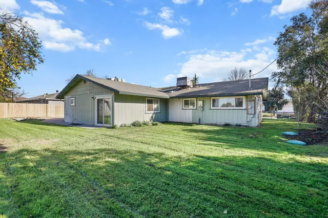 a view of a house with a big yard