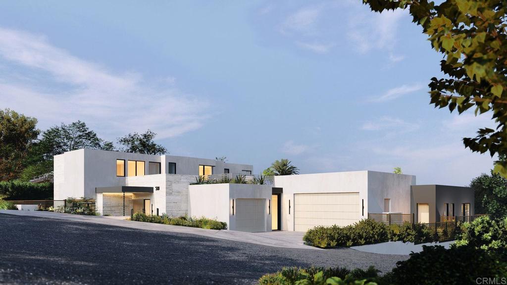 an aerial view of residential houses with street space