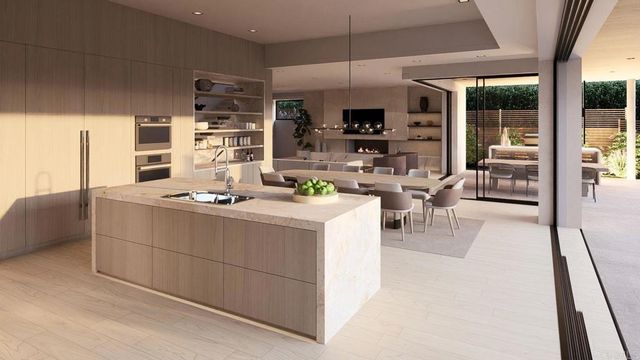 a living room with furniture a flat screen tv and a floor to ceiling window