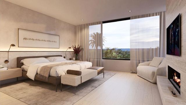 a spacious bedroom with a bed and a large window