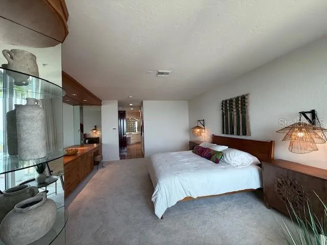 a view of an empty room with a fireplace