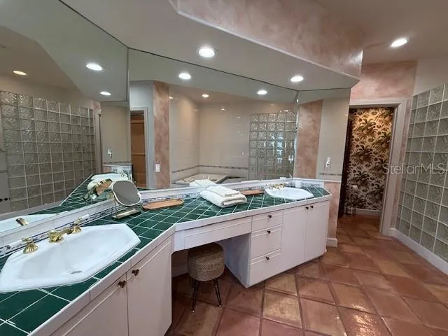 a bedroom with a bed and a television in it