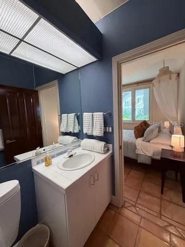 a kitchen with a sink cabinets and appliances
