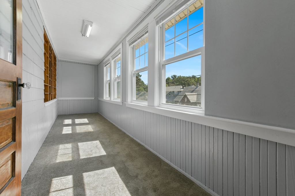 331-333 Vermont Street Boston, MA 02132 - Photo 24 of 26 a view of a hallway with windows