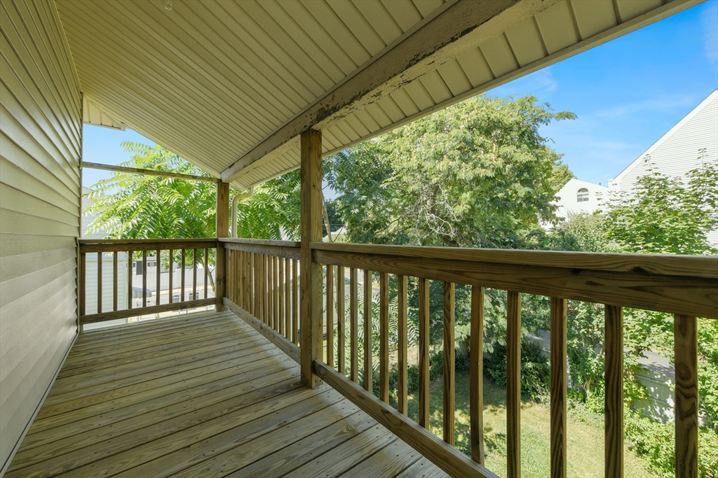 331-333 Vermont Street Boston, MA 02132 - Photo 25 of 26 a view of a wooden deck