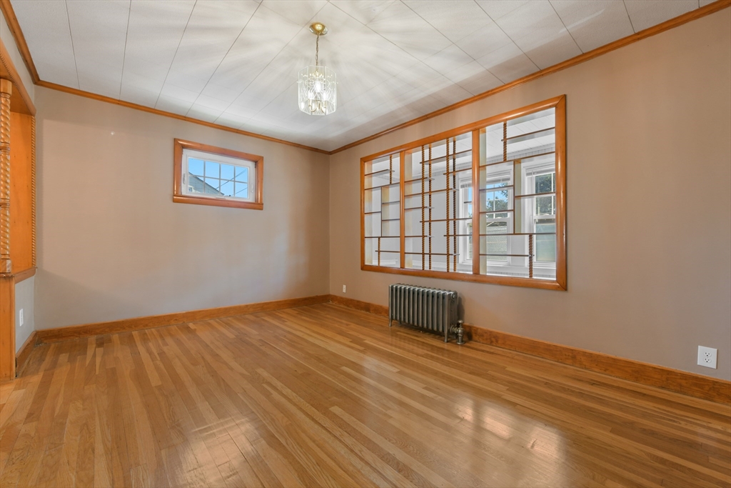 331-333 Vermont Street Boston, MA 02132 - Photo 8 of 26 a view of an empty room with a window