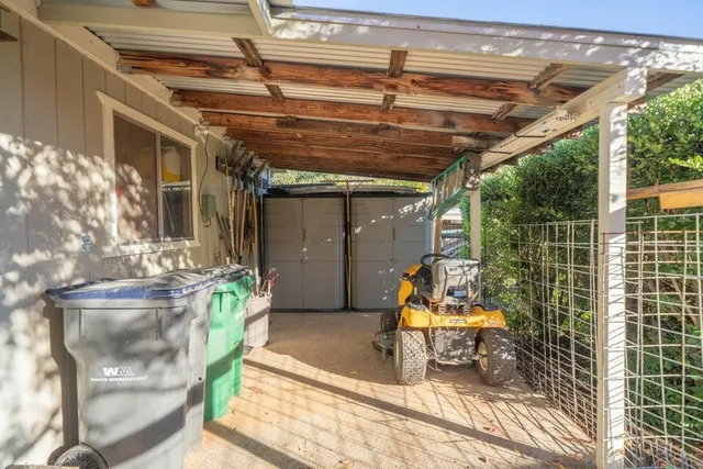a outdoor space with lots of potted plants