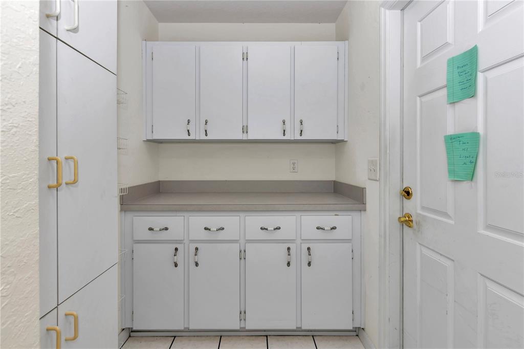 6793 Southwest 111th Loop Ocala, FL 34476 - Photo 45 of 47 Extra storage room off kitchen, door to 2 car garage