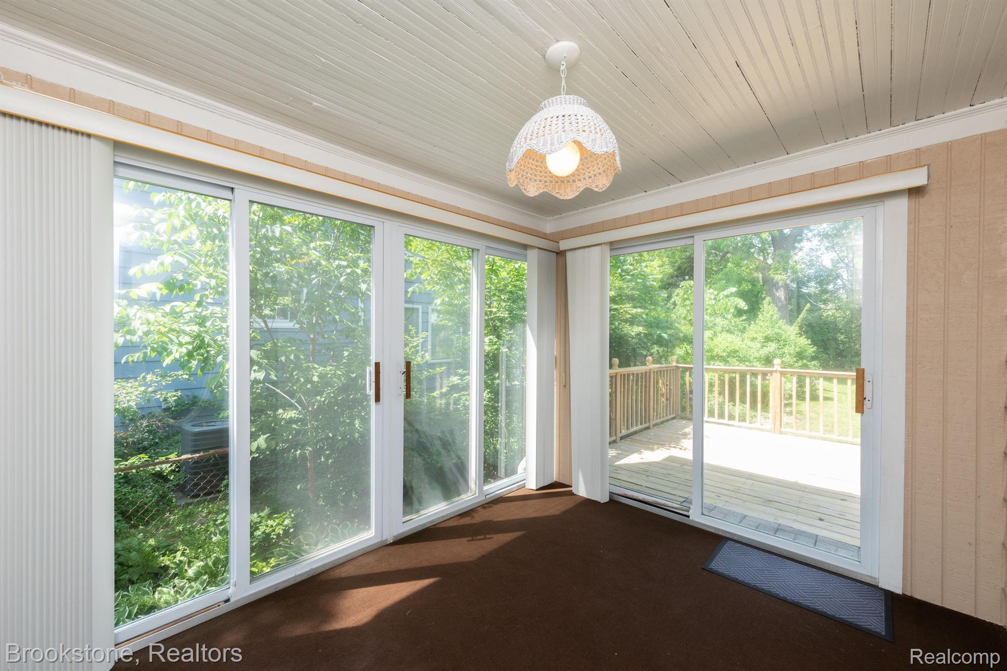 26 Chippewa Road Pontiac, MI 48341 - Photo 20 of 30 Sunroom leads to deck