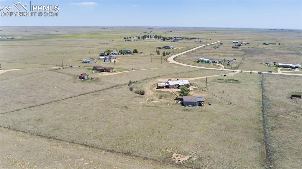 6260 Night Train Lane Yoder, CO 80864 - Photo 6 of 22 Birds eye view of property with a rural view