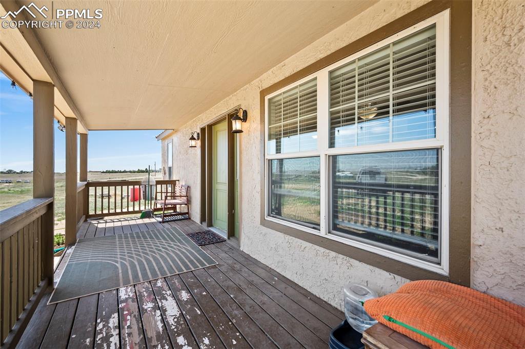 6260 Night Train Lane Yoder, CO 80864 - Photo 7 of 22 View of wooden deck