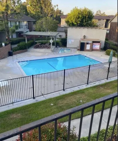 a view of a balcony with wooden floor