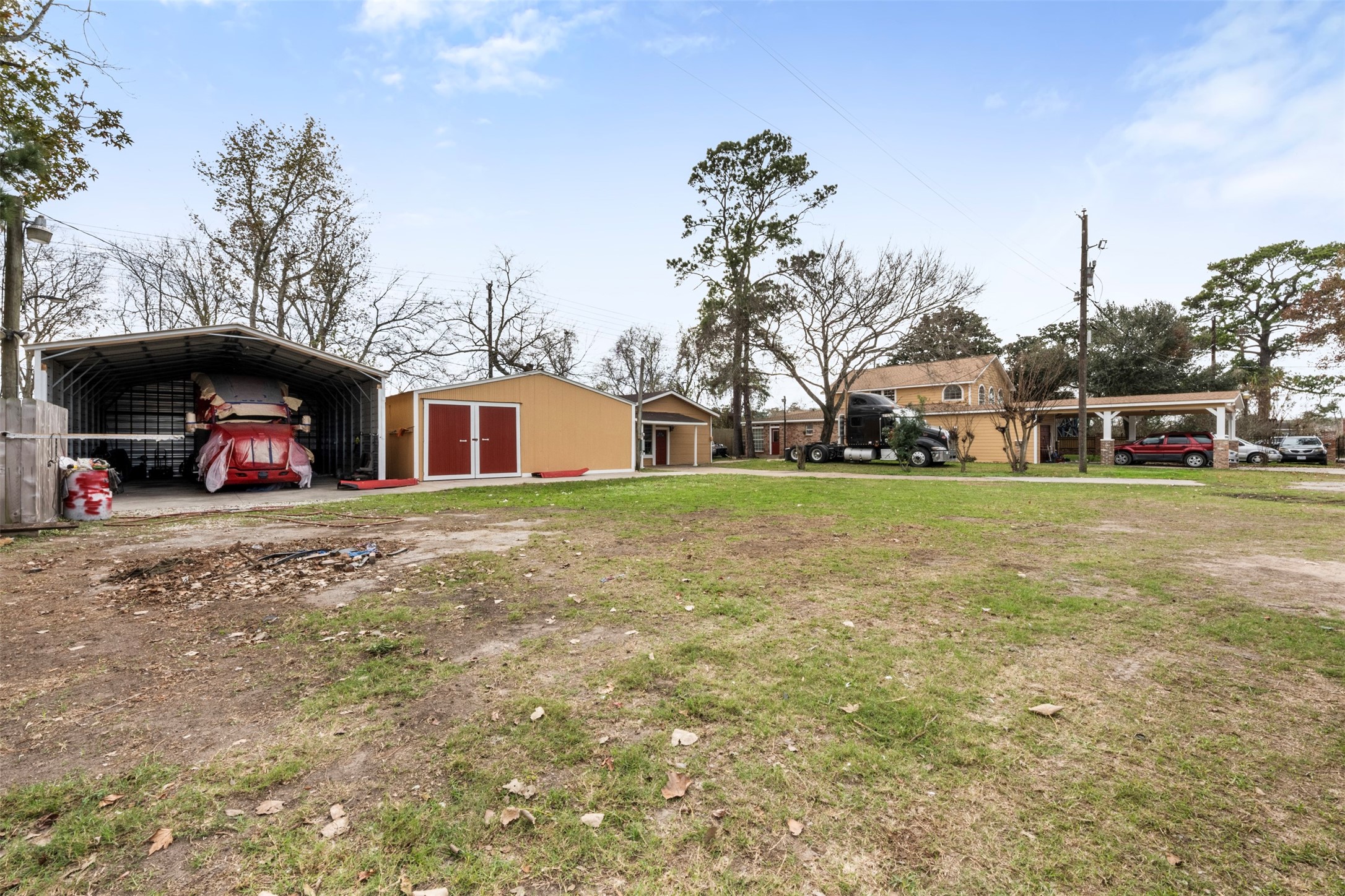 6900 Gregdale Road Houston, TX 77049 - Photo 34 of 49 a view of a house with a yard