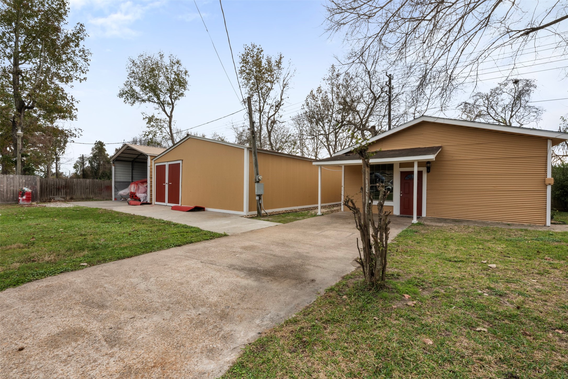 6900 Gregdale Road Houston, TX 77049 - Photo 35 of 49 a front view of house with yard and trees