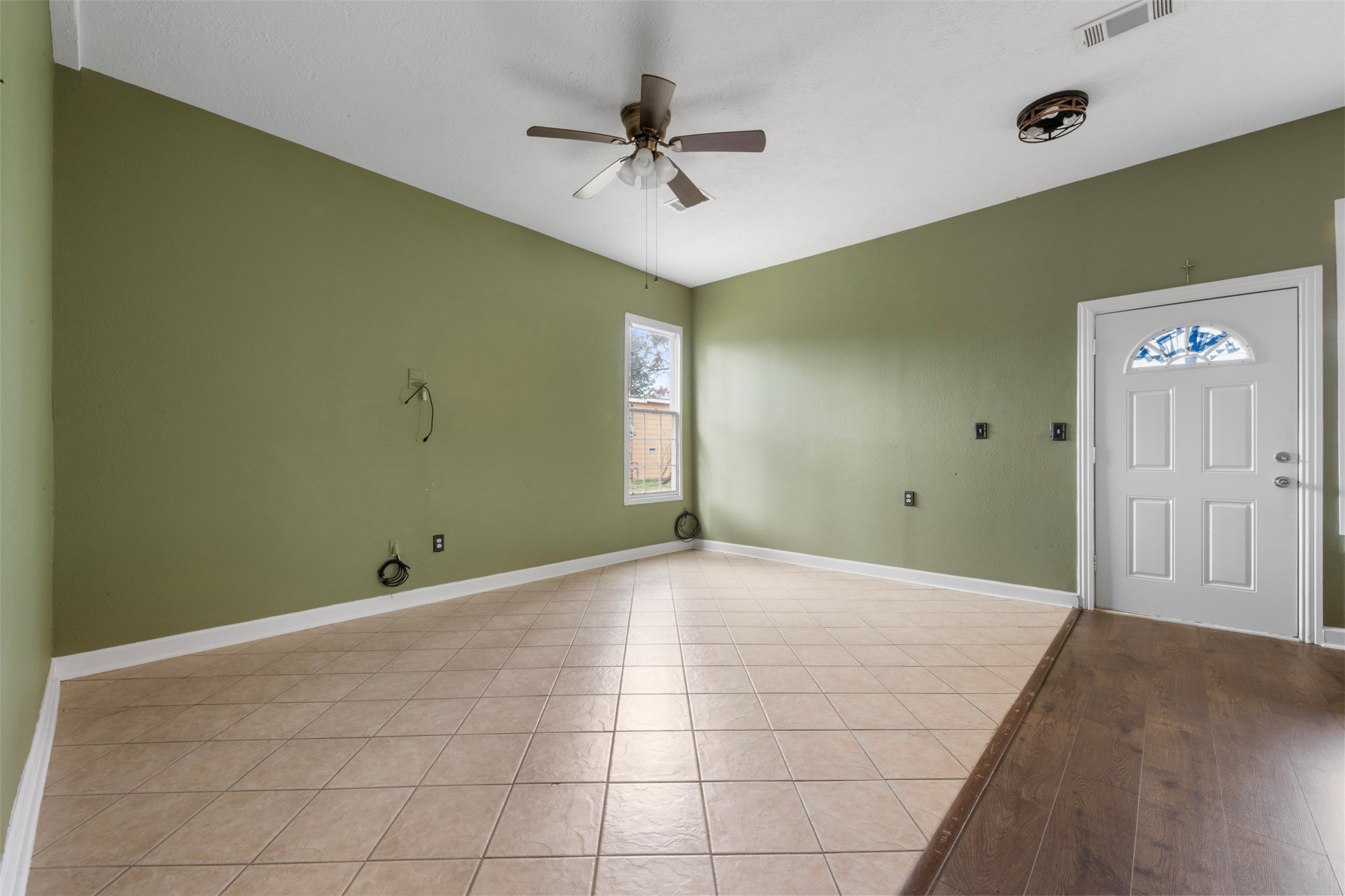 6900 Gregdale Road Houston, TX 77049 - Photo 37 of 49 a view of an empty room with a ceiling fan