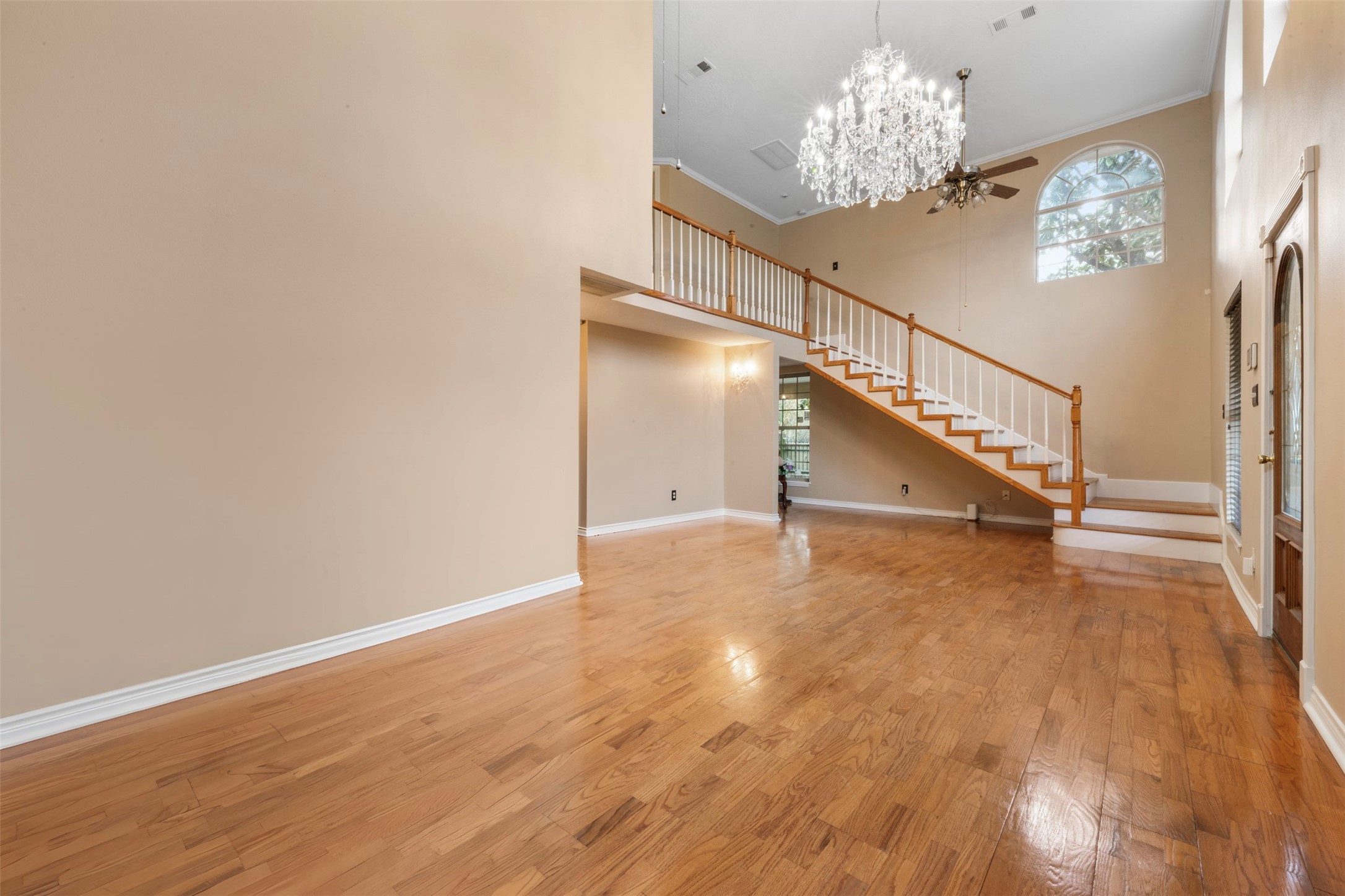 6900 Gregdale Road Houston, TX 77049 - Photo 7 of 49 a view of entryway and hall with wooden floor
