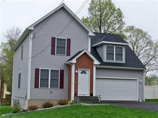136.5 Parker Farms Road Wallingford, CT 06492 - Photo 1 of 1 a view of front of a house with a yard