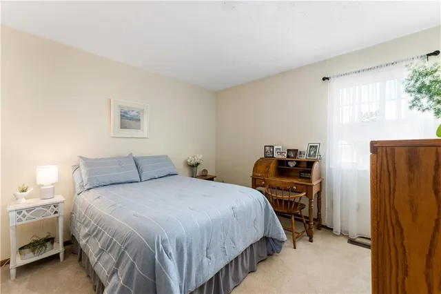 a bedroom with a bed and a closet