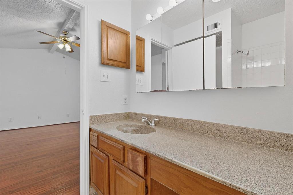 8545 Midpark Road, Unit 16 Dallas, TX 75240 - Photo 24 of 29 a view of an entryway with wooden floor